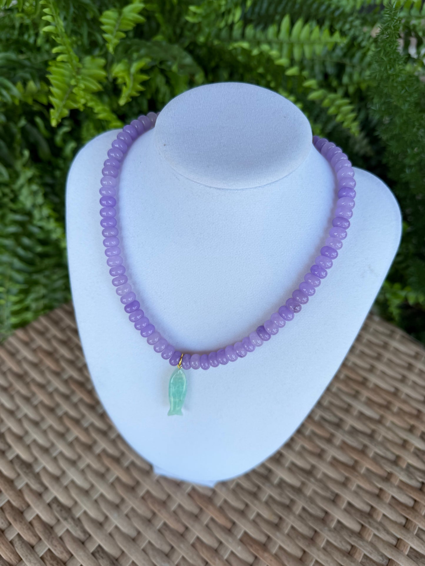 Purple necklace with fish