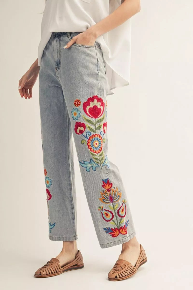 Embroidered washed denim pants