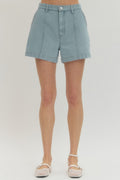Solid woven shorts featuring front seam detail