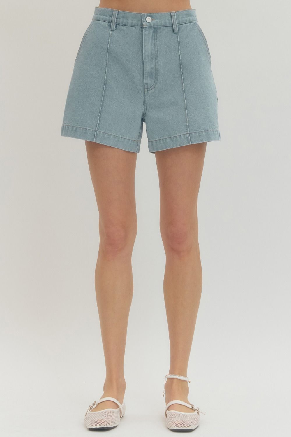 Solid woven shorts featuring front seam detail