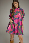 Magenta Printed puff sleeve mini dress featuring a ruffled mock neck