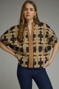 Black Printed short puff sleeve top featuring V-neck